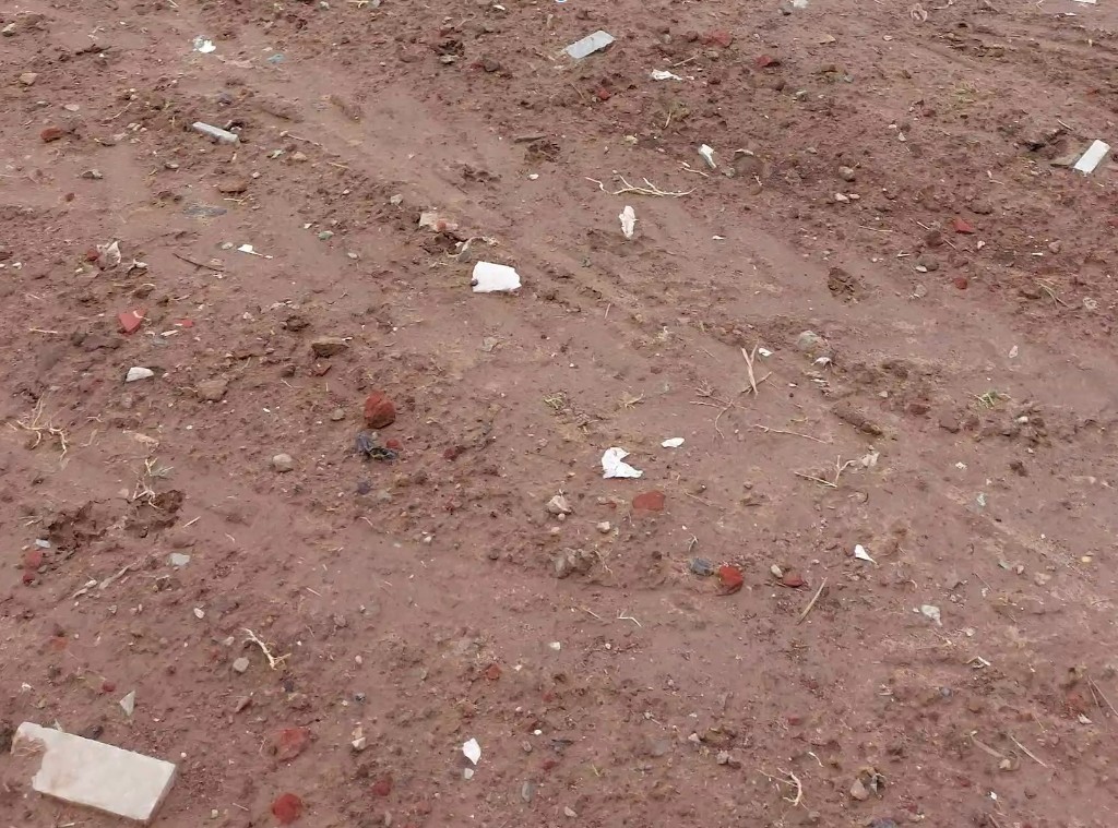 Poorly structured soil — compacted rubble and weak sandy fill before restoration